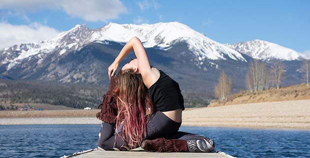 yoga pose with mountain view