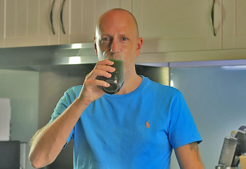 Adam drinking Supergreen Tonik